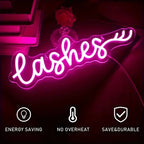 Neon sign with the word 'lasheshes' on a dark background, featuring icons and text about energy saving, no overheat, and save & durable.