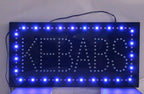 LED sign with 'kebabs' text on a white background