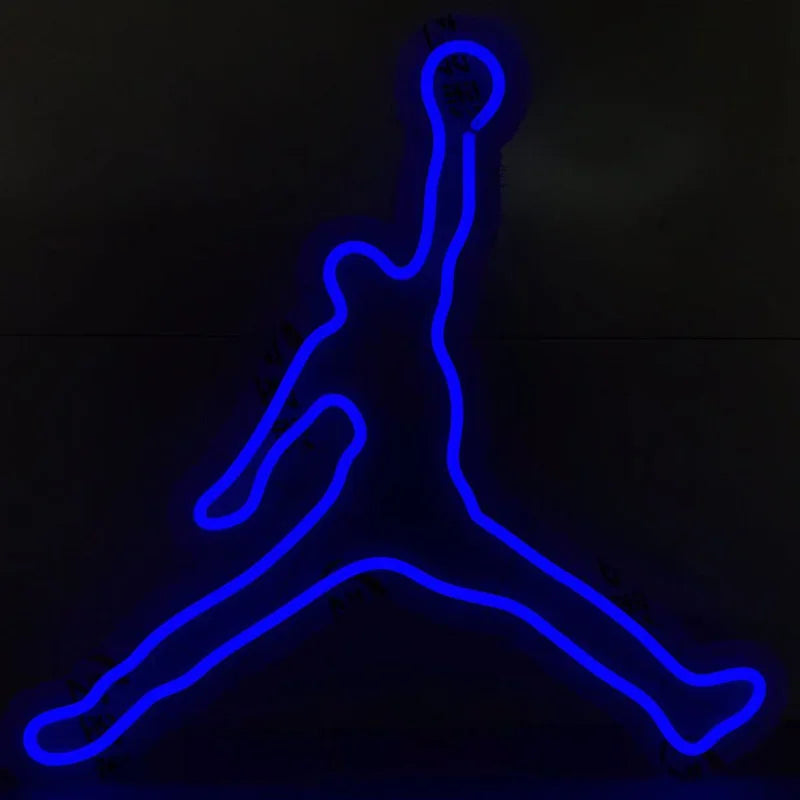 Blue neon outline of a jumping figure on a black background
