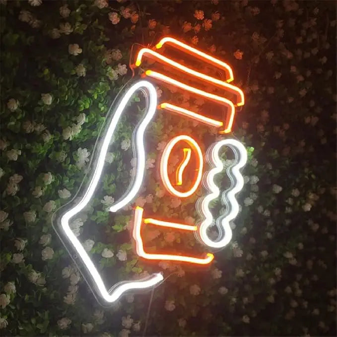 Neon sign of a coffee cup with steam and a question mark on a floral background