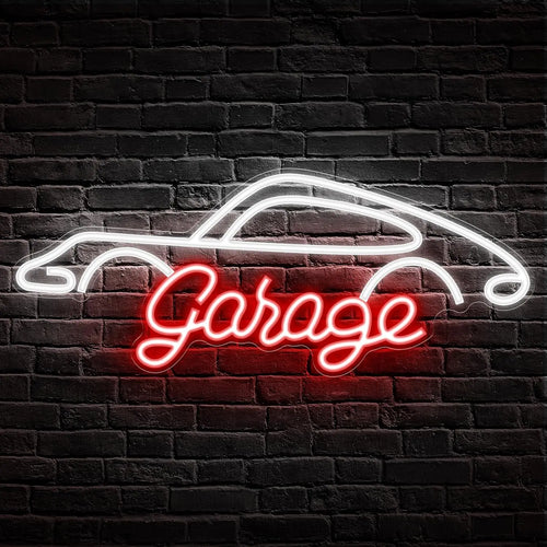 Neon sign with car outline and 'Garage' text on a brick wall background